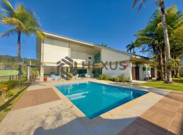 Foto · Casa de alto padrão com piscina e área gourmet no Jardim Acapulco, Guarujá