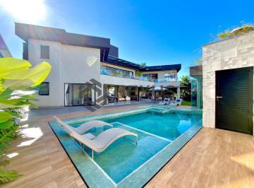 Foto · Casa de alto padrão com piscina e área gourmet no Jardim Acapulco, Guarujá