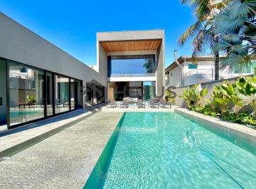 Foto · Casa de alto padrão com piscina e área gourmet no Jardim Acapulco, Guarujá