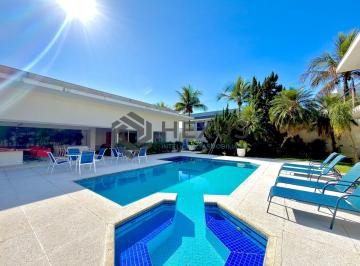 Foto · Casa de alto padrão com piscina e área gourmet no Jardim Acapulco, Guarujá