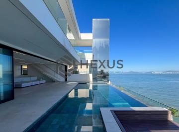 Foto · Casa frente mar com piscina e garagem náutica na Peninsula, Guarujá, SP