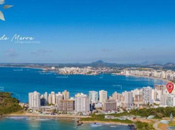 4-17685940417273.png · De frente para o mar da Praia do Morro. Alto padrão com lazer na cobertura e plantas amplas de 3 qua