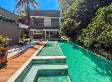 09c040e51c69b4a9a3b2dea74c54a48f697659be · Casa com 5 dormitórios à venda, 408 m² por R$ 4.500.000,00 - Riviera de São Lourenço - Bertioga/SP