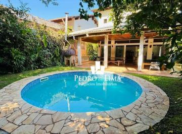 fb815c1934467f875b4d6cf718504e092cb873fc · Casa com 5 dormitórios à venda, 280 m² por R$ 3.200.000,00 - Riviera Módulo 28 - Bertioga/SP