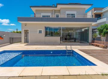 Casa · 404m² · 5 Quartos · 4 Vagas · Casa no condomínio Swiss Park para venda com 5 quartos, sendo 4 suítes, 404m²