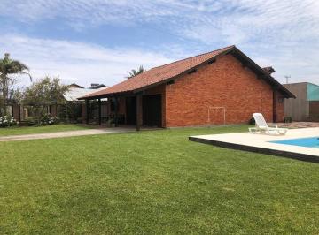 Casa · 150m² · 2 Quartos · 2 Vagas · 🏡 Casa com terreno amplo à venda no Litoral Norte/RS