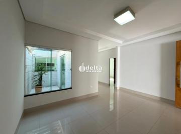 Casa · 130m² · 3 Quartos · 2 Vagas · Casa com 3 quartos  disponível para venda e locação  no bairro Jardim Holanda em Uberlândia-MG