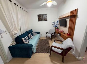 jek7idi2ytyzyweyytzkzgm1_md · Apartamento semimobiliado à venda na Guilhermina, em Praia Grande SP.