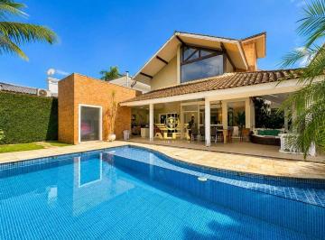 f3537c40ead05d4c4011213e1026650ed41fd43c · Casa com 4 Suítes, Piscina e Sauna no Jardim Acapulco – Alfa Imóveis Guarujá