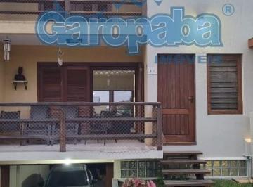 Foto 02 · Aluguel por temporada: Casa de 4 quartos com vista para o mar em Garopaba, bairro Morrinhos, 2 suíte