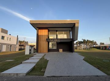 Casa · 474m² · 4 Quartos · 2 Vagas · Casa de 4 suítes no Ilhas Park em Torres - RS