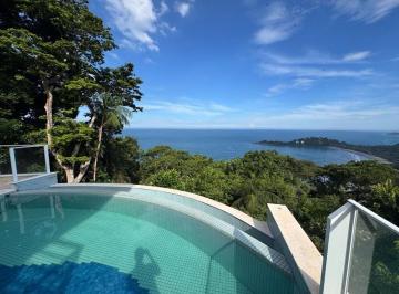 f50e50d9e5caa6d18ac8618186bed7d5ee842123 · Casa com 4 dormitórios à venda por R$ 20.000.000,00 - Taguaiba - Guarujá/SP