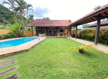 9eb0876dc648d5645cb592df90ff12bdc617d860 · Casa com 4 dormitórios à venda por R$ 1.800.000,00 - Pernambuco I - Guarujá/SP