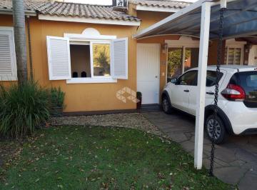 Photo 1 · Casa em condomínio com patio e 2 vagas em Canoas