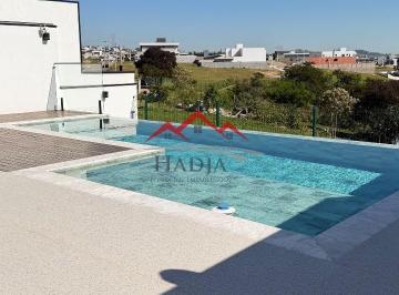 Foto 02 · Casa de Alto Padrão no Villagio Azzure: 3 suítes, área gourmet, piscina com vista para preservação e