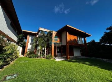 Foto 01 · Casa à venda com 350m², 5 suítes mais dependência completa e terreno de 600m² no Condomínio Praia Be