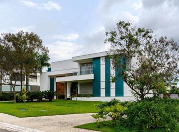 Casa · 609m² · 5 Quartos · 5 Vagas · A mesa é para 12 lugares. A experiência não cabe em números.
