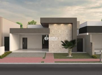 Casa · 275m² · 3 Quartos · 4 Vagas · Casa com 3 quartos sendo  suíte disponível para venda no bairro Grand Ville em Uberlândia-MG