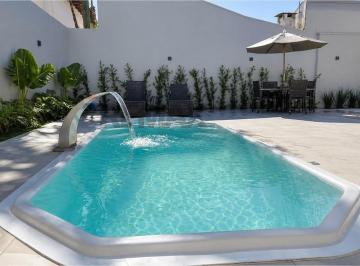 Casa · 354m² · 4 Quartos · 4 Vagas · Casa de Praia com Piscina Aquecida em Matinhos – 354 m², 4 Quartos e 2 Quadras do Mar | R$ 1.720.000