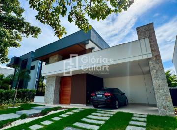 Foto 01 · Casa de 3 suítes com espaço gourmet e piscina localizada no condominio Alphaville Jacuhy na Serra -