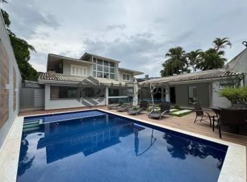 Foto · Casa reformada com piscina e área gourmet no Jardim Pernambuco I, Guarujá