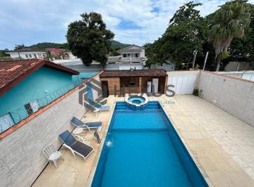 Foto · Casa com piscina e área gourmet no Pernambuco, Guarujá