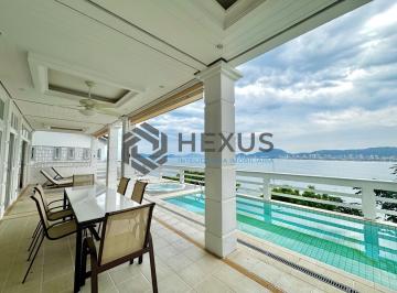Foto · Casa frente mar com piscina e área gourmet no Condomínio Península na Praia da E