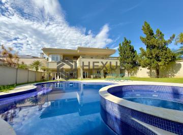 Foto · Casa de alto padrão com piscina e área gourmet no Jardim Acapulco, Guarujá