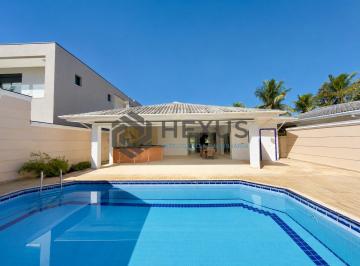 Foto · Casa de alto padrão com piscina e área gourmet no Jardim Acapulco, Guarujá