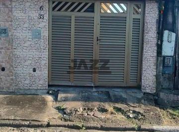 Casa · 75m² · 2 Quartos · 1 Vaga · Casa Sobreposta Baixa à Venda na Areia Branca em Santos com Quintal e Garagem Coberta