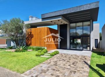Casa · 254m² · 4 Quartos · 2 Vagas · Casa em Condomínio com 210m², 4 dorm. no bairro Capão da Canoa em Capão da Canoa