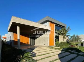 Casa · 221m² · 4 Quartos · 2 Vagas · Casa em Condomínio com 221m², 4 dorm. no bairro Centro em Passo de Torres