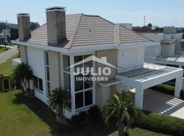 Casa · 288m² · 4 Quartos · 2 Vagas · Ótima Residência Localizada no Único Condomínio Fechado a Beira Mar em Torres.