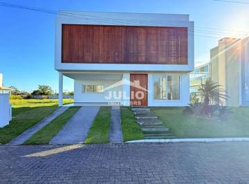Casa · 367m² · 4 Quartos · 2 Vagas · Casa em Condomínio com 367m², 4 dorm. no bairro Centro em Passo de Torres