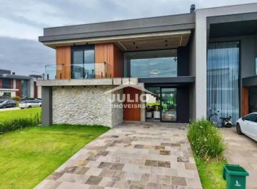 Casa · 220m² · 4 Quartos · 2 Vagas · Casa em Condomínio com 220m², 4 dormitórios  em Xangri-Lá