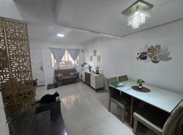 Photo 1 · Casa em condomínio com 2 dormitórios/ pátio e vaga