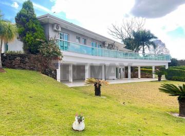 Casa · 598m² · 5 Quartos · Locação - Residência de luxo com 5 suítes e lazer completo – última oportunidade