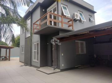 Casa · 240m² · 3 Quartos · 10 Vagas · Sobrado com piscina, quiosque e casa auxiliar em amplo terreno de 500m²