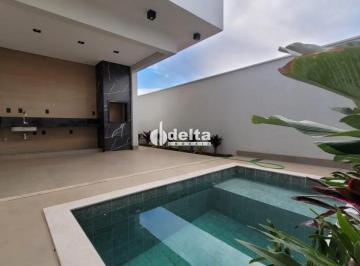 Casa · 295m² · 3 Quartos · 4 Vagas · Casa em condomínio com 3 suítes disponível para venda no bairro Novo Mundo em Uberlândia-MG