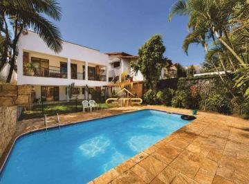 Casa · 485m² · 5 Quartos · 5 Vagas · Casa com 5 Dormitórios sendo 4 Suítes com Piscina, Lareira e Espaço Gourmet