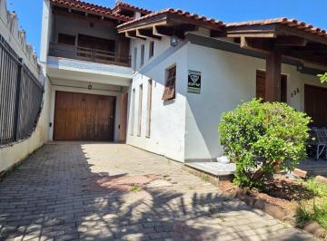 Casa · 311m² · 4 Quartos · 4 Vagas · Casa 4 dormitórios na Rua Camaquã