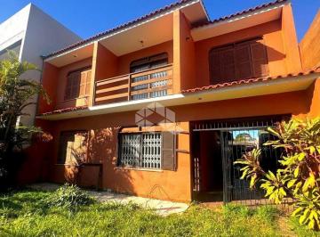 Frente · Casa ampla com 203m², 4 dormitórios e 4 vagas cobertas no Bairro Marechal Rondon - Canoas