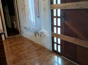 Casa · 560m² · 3 Quartos · 2 Vagas · Casa com amplo terreno com 3 dormitórios, 2 banheiros e 2 vagas na garagem no bairro Belém Novo
