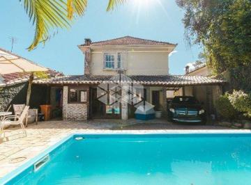 Casa · 390m² · 4 Quartos · 6 Vagas · Casa com 4 dormitórios e elevador no Bairro Petrópolis