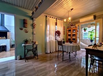 Casa · 145m² · 4 Quartos · 2 Vagas · Casa Reformada e Ampla no Bairro Costa e Silva - Oportunidade Única!