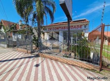 Casa · 258m² · 5 Quartos · 2 Vagas · Casa ampla no centro de Guaíba - ideal para morar ou investir