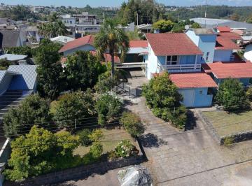 Casa · 550m² · 4 Quartos · 2 Vagas · Casa com quatro dormitórios sendo um suíte no bairro Bela Vista em Farroupilha
