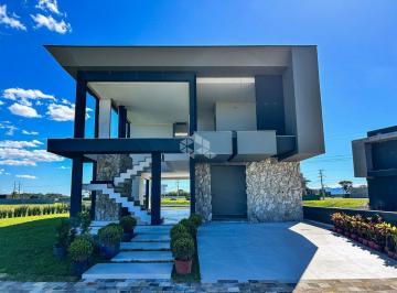 Apartamento · 235m² · 4 Quartos · 2 Vagas · Sobrado beira lago, 4 suítes sendo 1 terrea, novo nunca habitado, com piscina e vista plena no condo