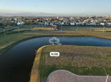 Terreno · 534m² · Terreno a beira lago no condomínio Lotus em Atlântida
