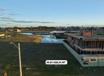 Terreno · 450m² · Terreno a beira lago no condomínio Lotus em Atlântida - Xangri-lá